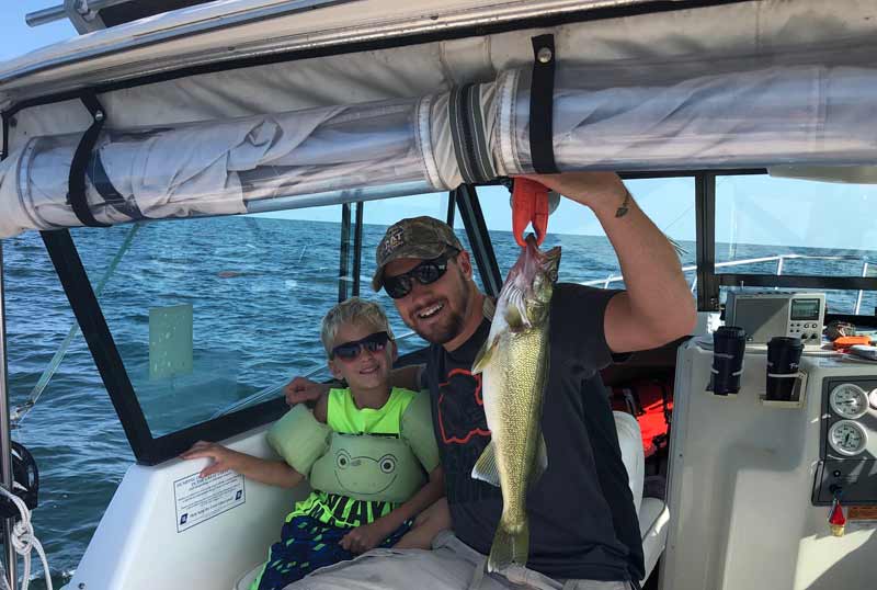 Father and son fishing charter Lake Erie walleye fishing